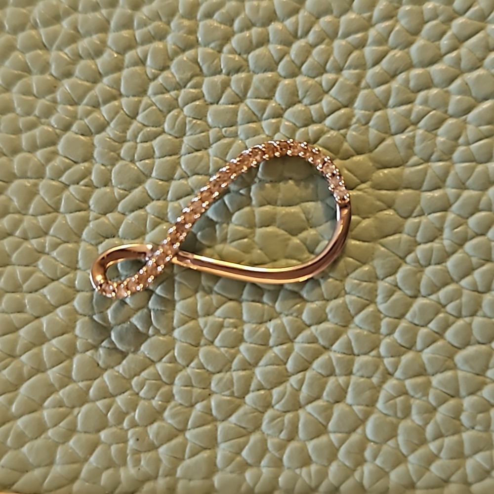 Kay's Dainty 10K white gold twisted teardrop pendant with .20 CTW diamonds